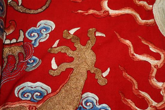 A Chinese embroidered silk dragon wall hanging, early 20th century